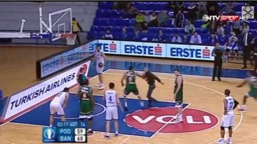 Fan decked after attacking players in Euro Cup basketball game!