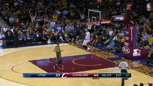 LeBron James with breakaway reverse dunk