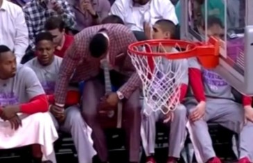 Awkward: Dwight Howard touches Isaiah Canaan in groin area
