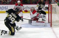 Canes goalie Cam Ward makes an incredible catching glove stop