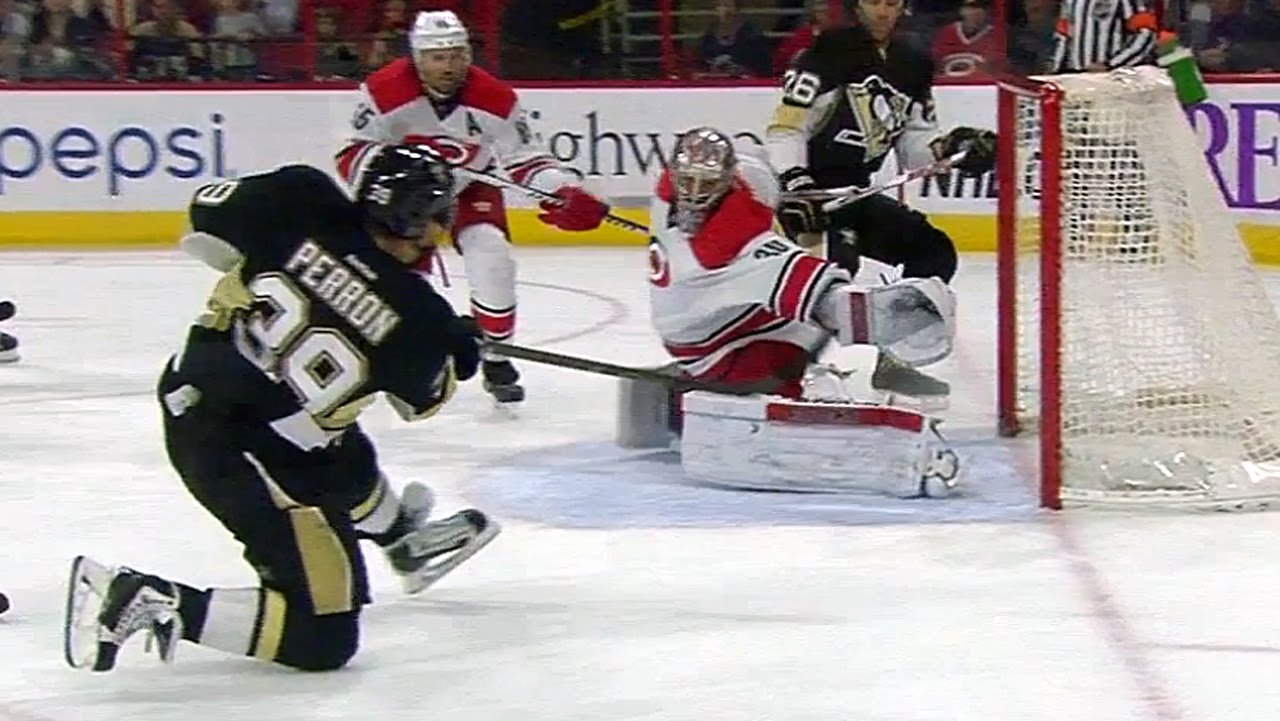 Canes goalie Cam Ward makes an incredible catching glove stop
