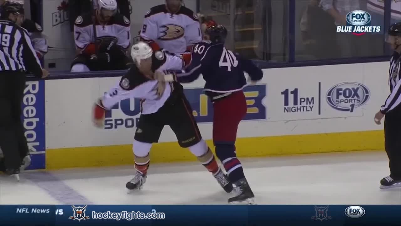 Jared Boll drops Clayton Stoner with an uppercut