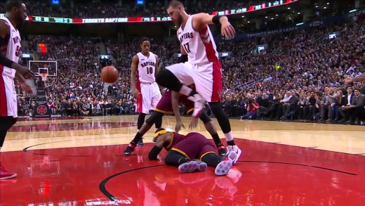 LeBron James swipes at Jonas Valanciunas after being flagrantly fouled