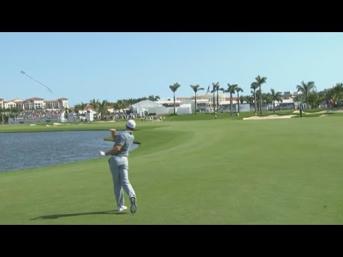 Rory McIlroy dashes his club into the water at the Cadillac Championship