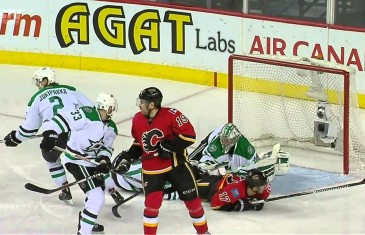 Scary moment: Antoine Roussel of the Dallas Stars takes puck to back of the head