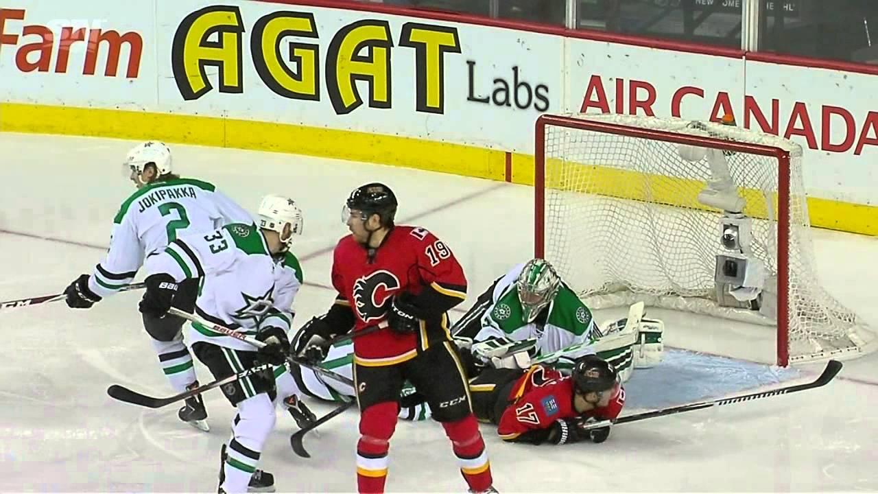 Scary moment: Antoine Roussel of the Dallas Stars takes puck to back of the head
