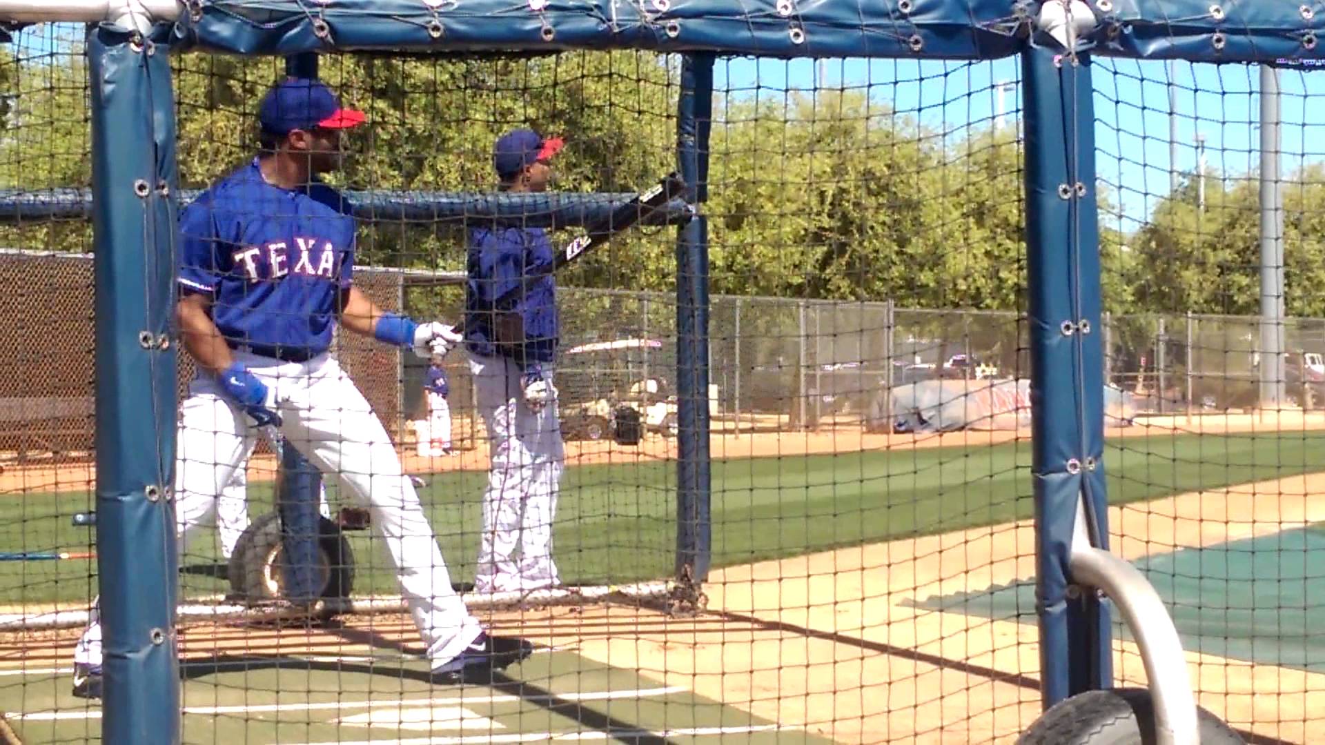 Seahawks QB Russell Wilson takes BP with the Texas Rangers