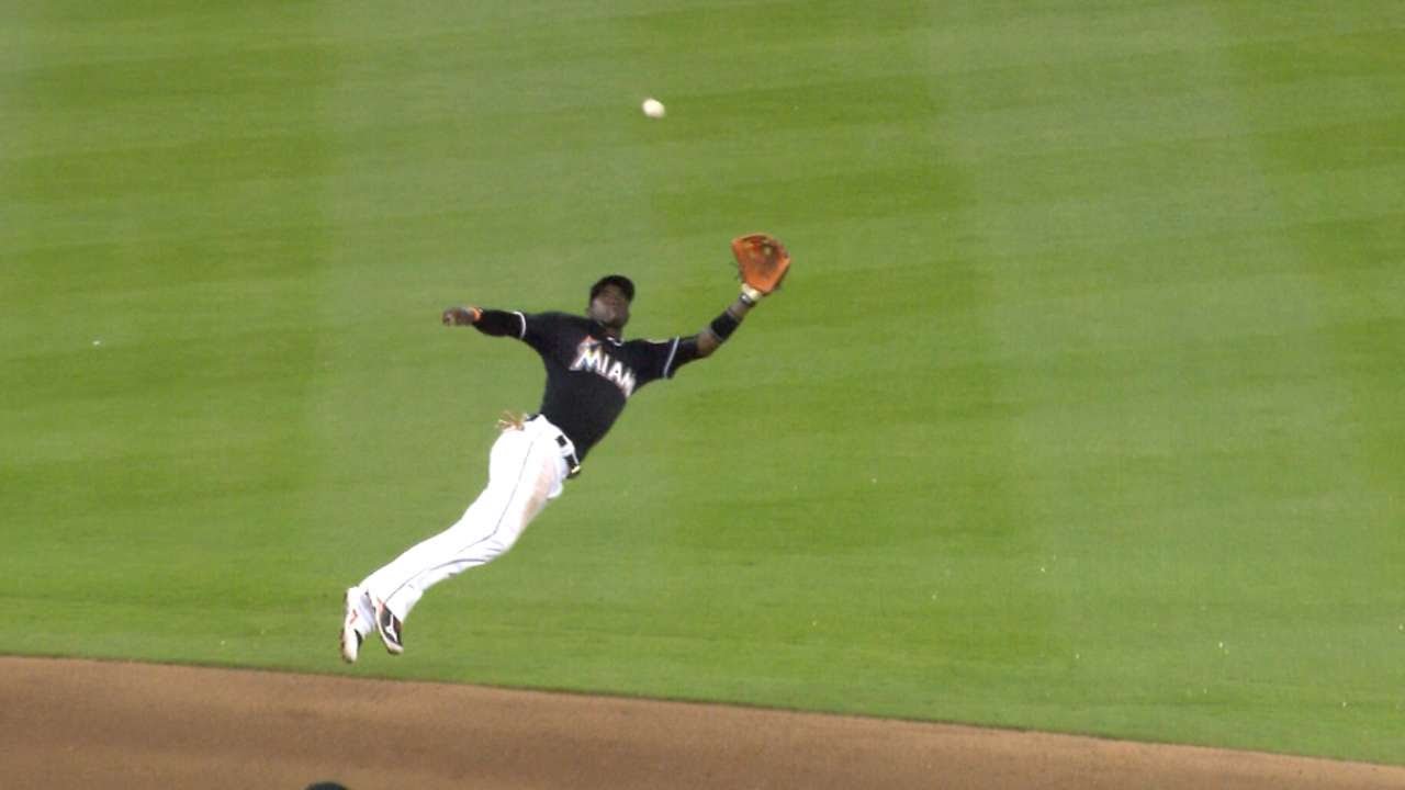 Adeiny Hechavarria fully extends to catch a line drive