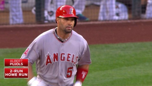 Albert Pujols deposits a shot into the upper tank at Safeco