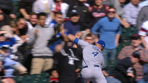 Alex Gordon dives into the stands to make catch