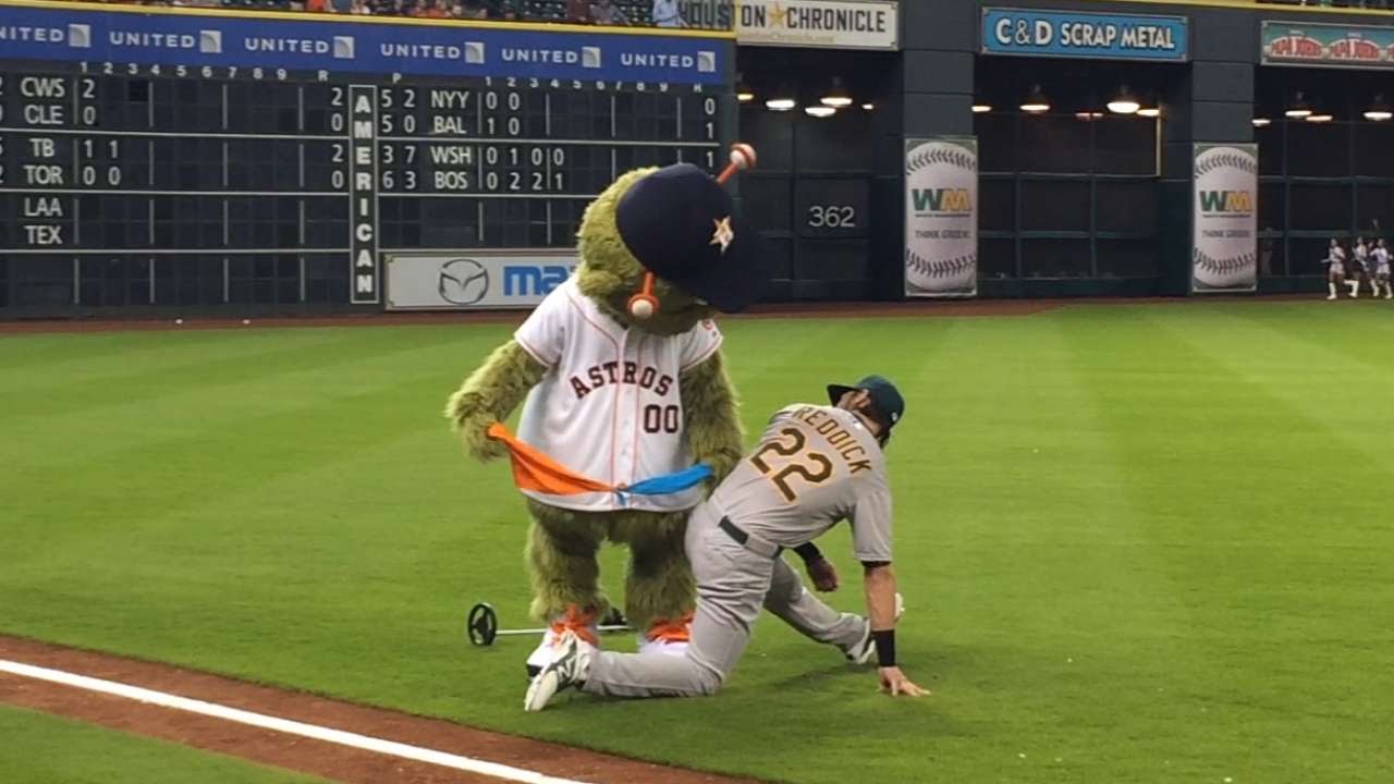 Astros mascot Orbit finds handkerchiefs on Josh Reddick