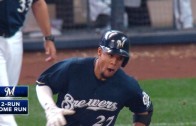 Carlos Gomez homers the pitch after he swings his helmet off