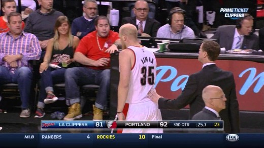 Chris Kaman shoves Chris Paul after a groin shot