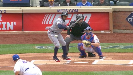 Eric Young Jr. bloops a bunt into the outfield