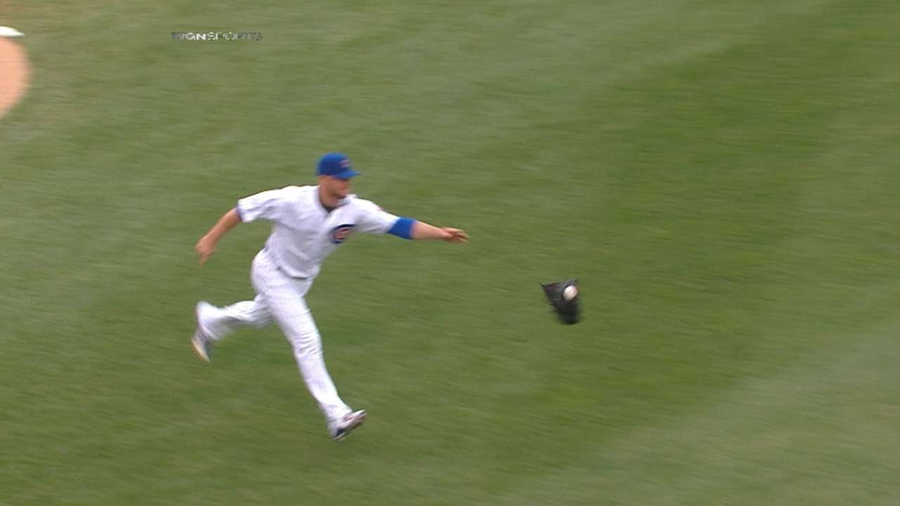 Jon Lester tosses glove to make the out at first