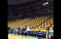 LeBron James drills a baseball throw in from one end of the court to the other