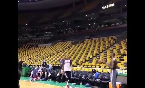 LeBron James drills a baseball throw in from one end of the court to the other