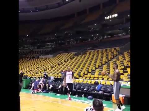 LeBron James drills a baseball throw in from one end of the court to the other