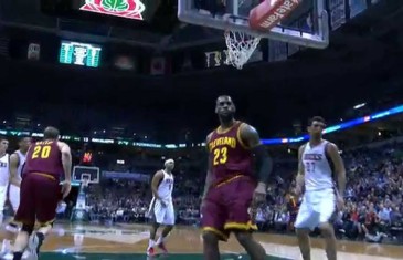 LeBron James throws down the slam from the no look Irving feed
