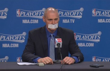 Rick Carlisle covers his mouth with tape in press conference