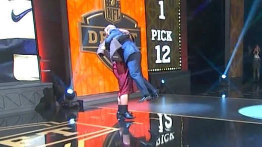 Danny Shelton bear hugs Roger Goodell off of the ground