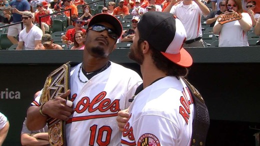 Adam Jones & WWE champion Seth Rollins face off in a stare down