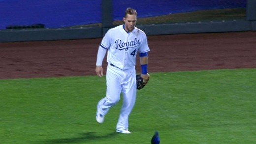 Alex Gordon robs Frazier as he crashes into fence