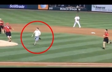 Baseball fan runs on the field & summersaults over home plate