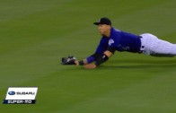 Carlos Gonzalez lays out to make an impressive grab