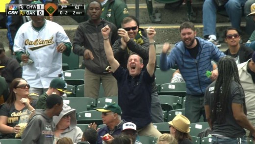 Fan goes ballistic in celebration after snaring foul ball