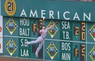 Giancarlo Stanton goes flying into the wall & makes spectacular catch