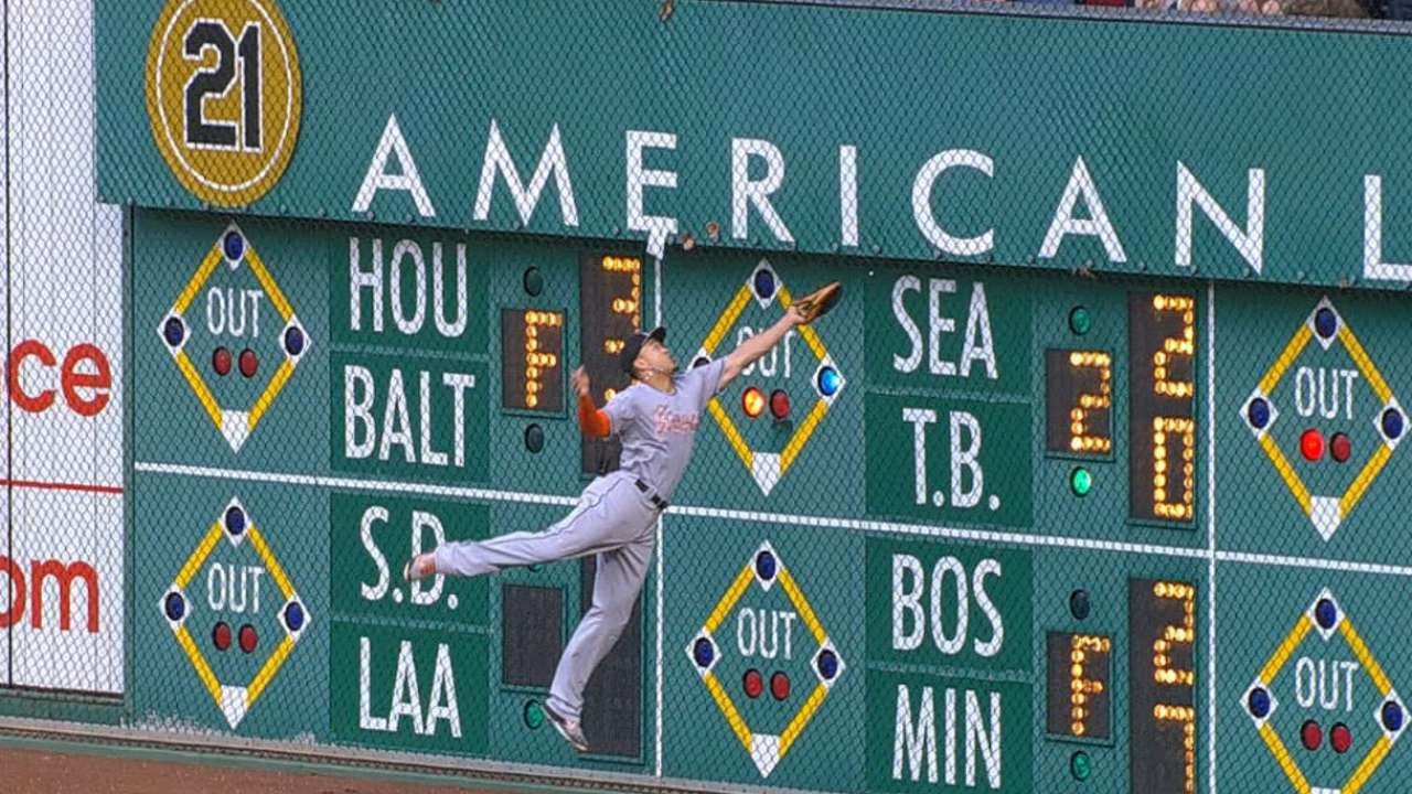Giancarlo Stanton goes flying into the wall & makes spectacular catch