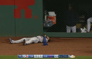 Kevin Pillar makes an outstanding grab slamming into wall