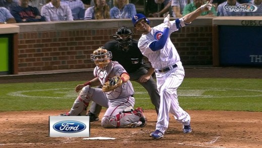 Kris Bryant belts a solo shot off the new Cubs scoreboard