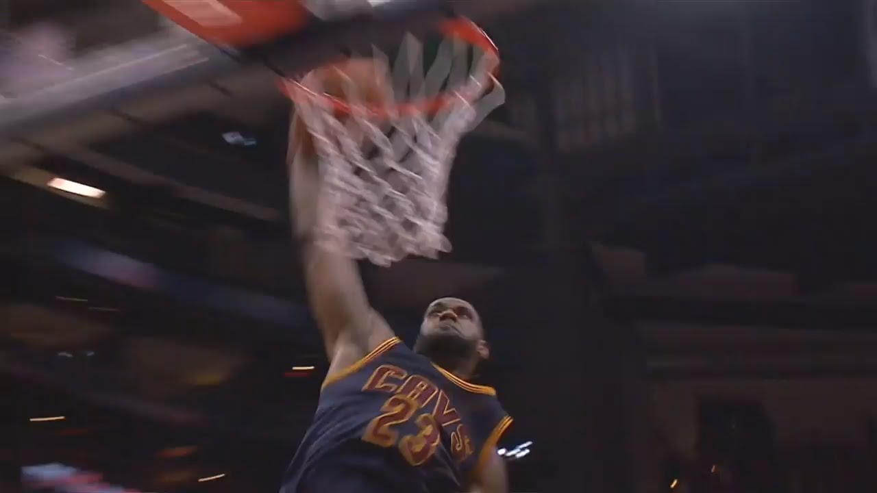 LeBron James soars for the massive finish & Hawks players duck out the way