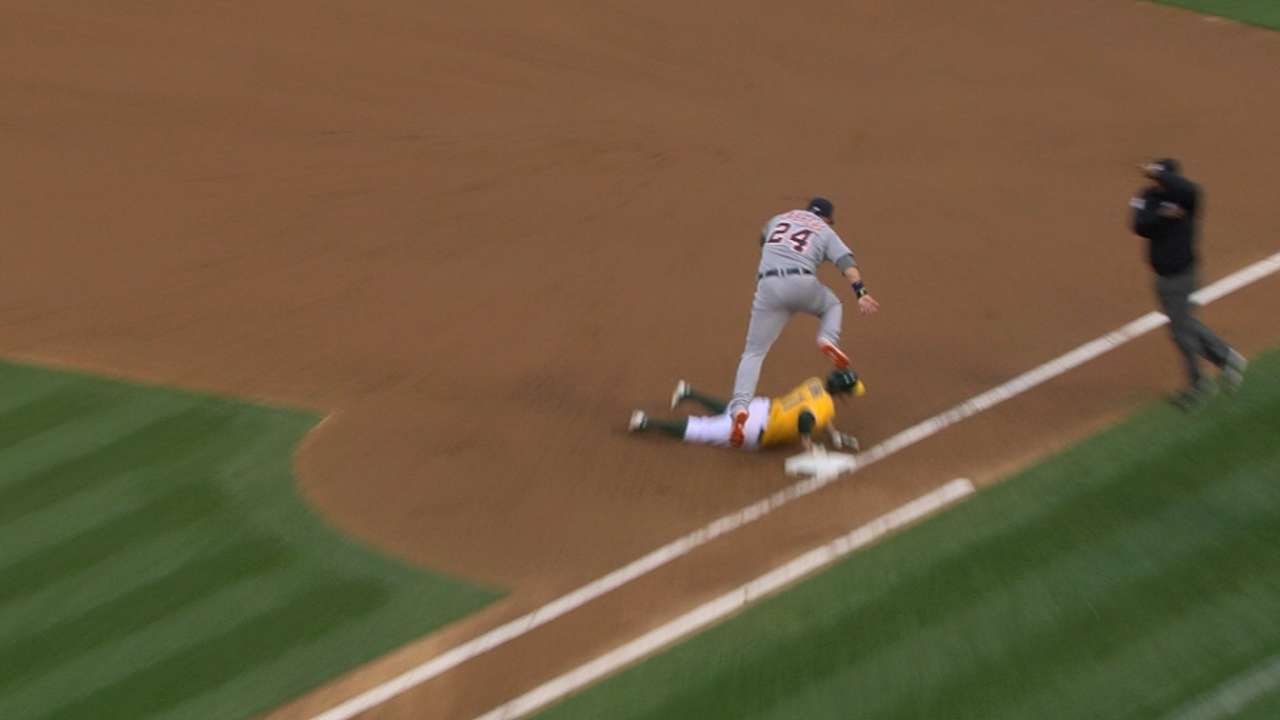 Miguel Cabrera pretends the ball has been thrown away on a pickoff