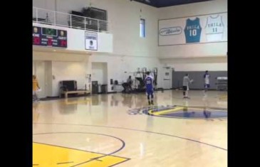 Steph Curry hits a no-look over the shoulder shot in practice