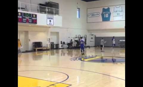 Steph Curry hits a no-look over the shoulder shot in practice