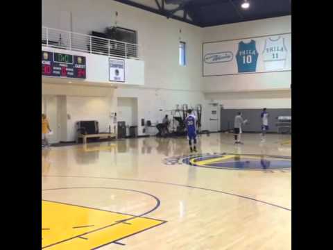 Steph Curry hits a no-look over the shoulder shot in practice