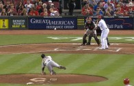 Tim Lincecum slips while throwing a pitch