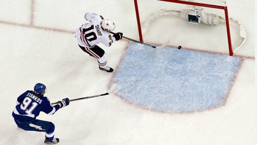 Ben Bishop collides with Hedman causing a slam dunk goal for Patrick Sharp