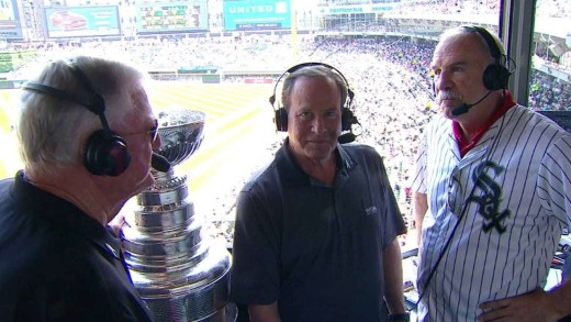 Blackhawks head coach Joel Quenneville brings the Stanley Cup to White Sox booth