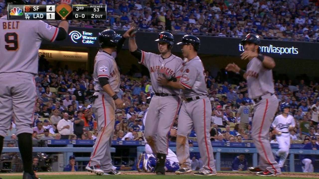Buster Posey smacks a grand slam to left field in the 3rd
