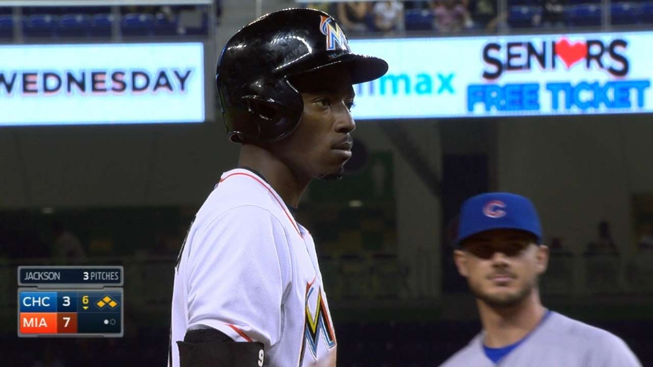 Dee Gordon slides safely into 2nd base but thinks he is out