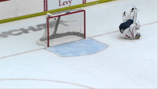 JJ Watt skates with the Wisconsin Badgers & drills home a slap shot