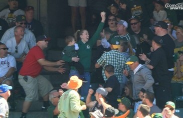 Oakland A’s fan catches foul ball while holding child