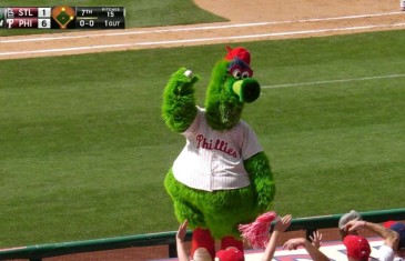 Phillie Phanatic dives on dugout to get foul ball