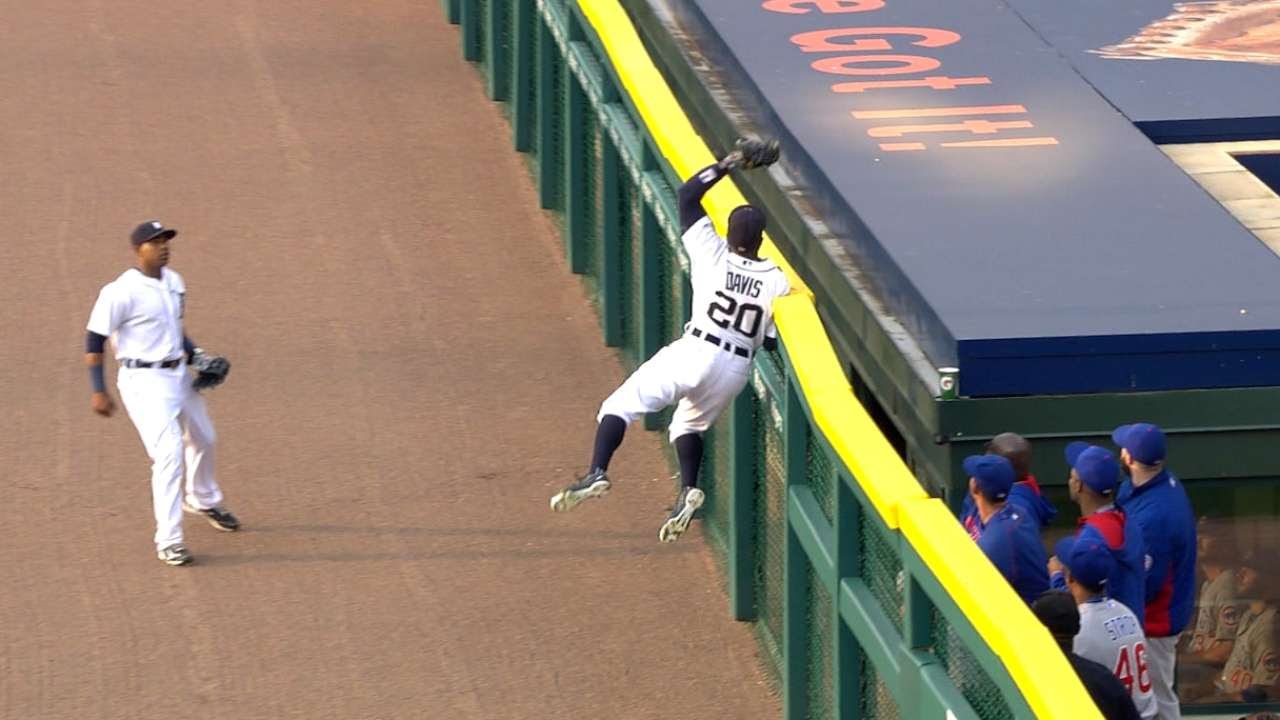 Rajai Davis goes up high to pull back a homer from David Ross