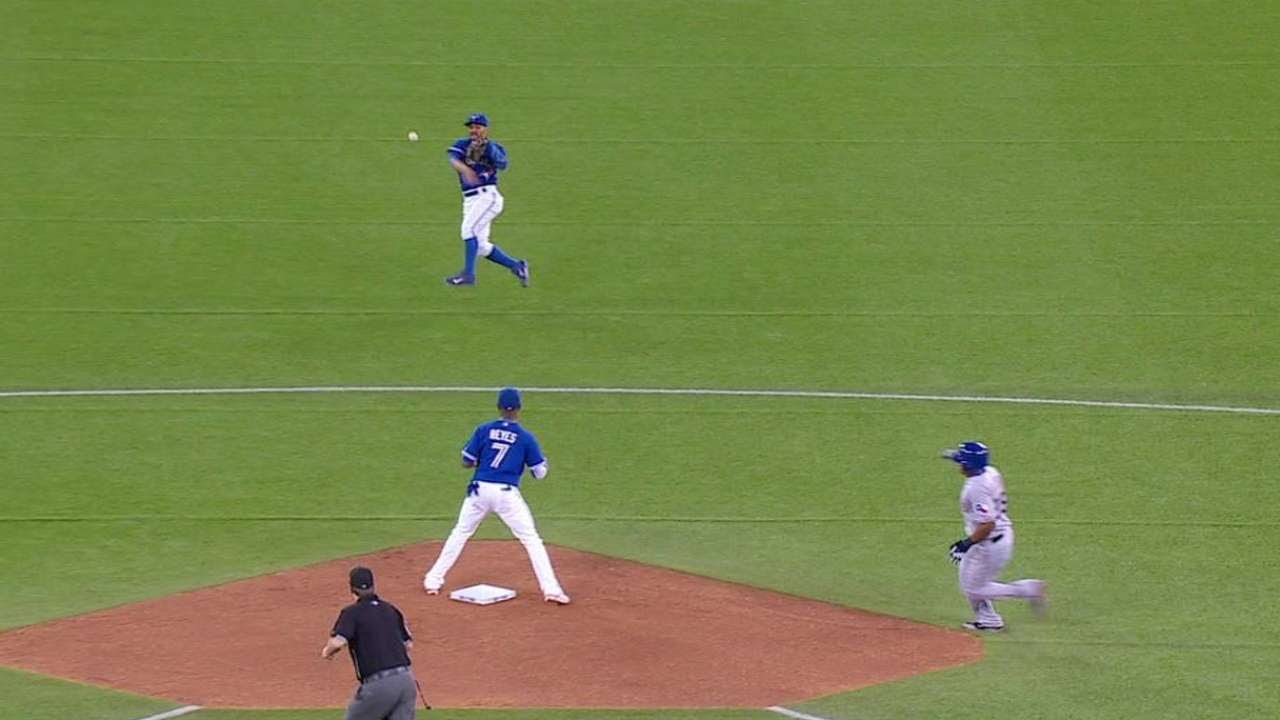 Rare Play: Devon Travis backs up Reyes after an overthrow
