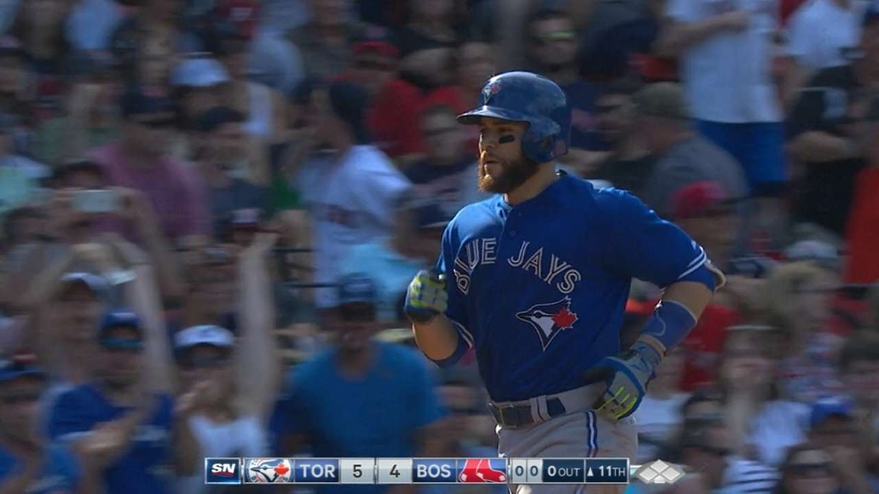 Russell Martin blasts a solo homer in the 11th to give Jays 10th win in a row